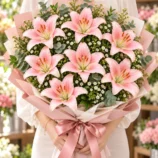 7 Pink Lily Bouquet w model